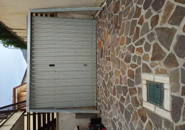 Porta basculante garage in ferro zincato