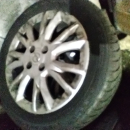 4 gomme Opel Corsa d con cerchi in lega